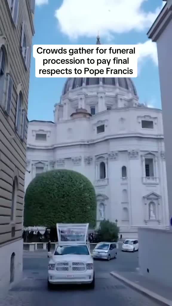 Do you see the emblem? 

Pope Francis is taken to his final resting place in the popemobile, giving ...